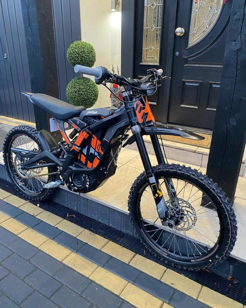 Buy the Mad Man Mechanics 2025 Surron Light Bee X Black with a 60V 38Ah Samsung battery, 6000W motor, 50 mph top speed, and nationwide shipping available.