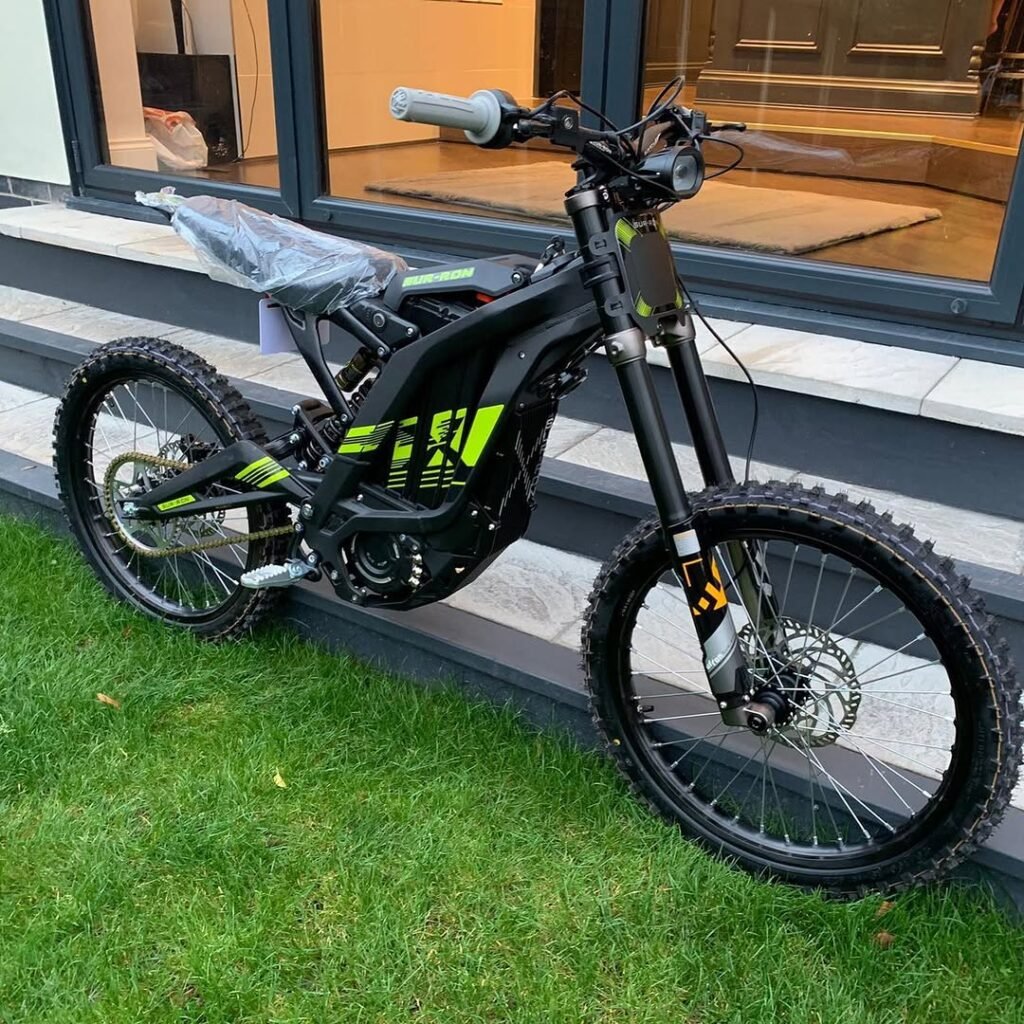 Buy the Mad Man Mechanics 2024 Surron LBX Black & Blue. Lightweight electric dirt bike with instant torque, off-road performance, and nationwide shipping available.