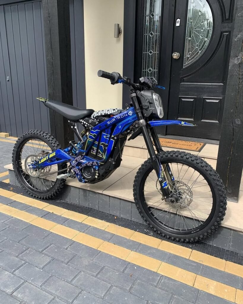 Buy the Mad Man Mechanics 2025 Sky Blue Surron LBX with 0 miles, new 60V 38Ah battery, new tyres, graphics, brake levers, and nationwide shipping available.