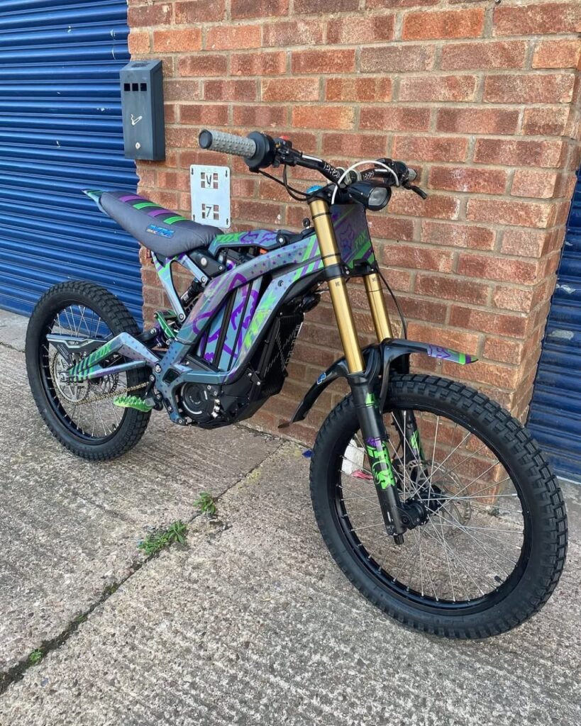 Buy the Mad Man Mechanics 2024 Surron LBX with only 4 miles, Fox 40 Kashima forks, Shimano Saint brakes, custom Fox graphics, carbon chain guard, and nationwide shipping available.