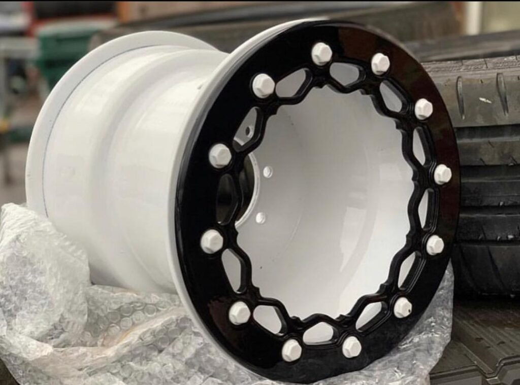 Buy Mad Man Mechanics White & Black Beadlock Wheels in 10x5 front and 9x8 rear sizes. Premium ATV wheels with beadlock design and worldwide shipping available.